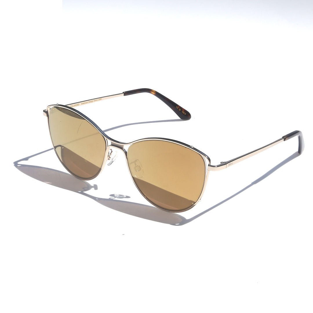 Gold-framed sunglasses with brown lenses on a white background