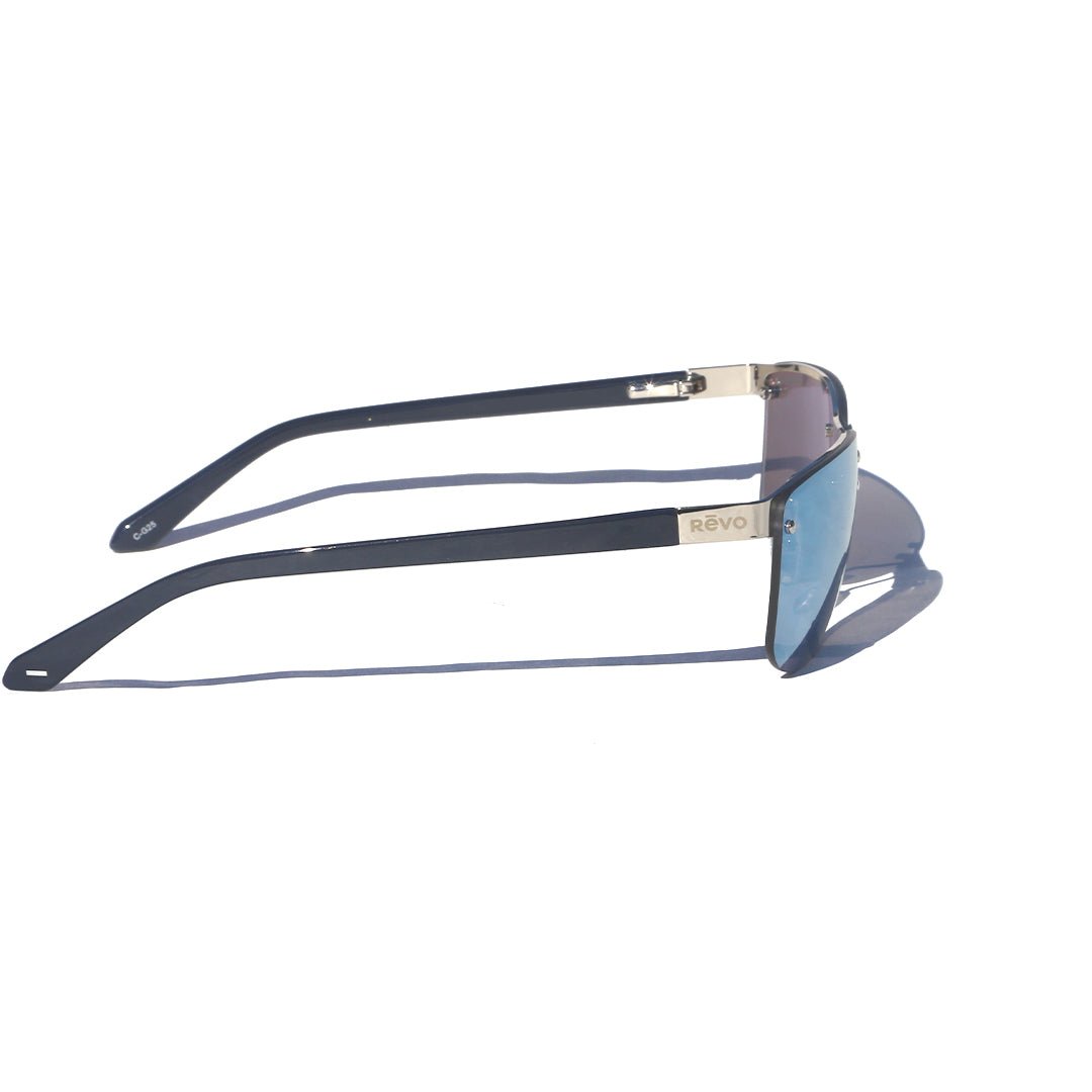 Lex rimless sunglasses with blue shield lenses and slim navy temples.