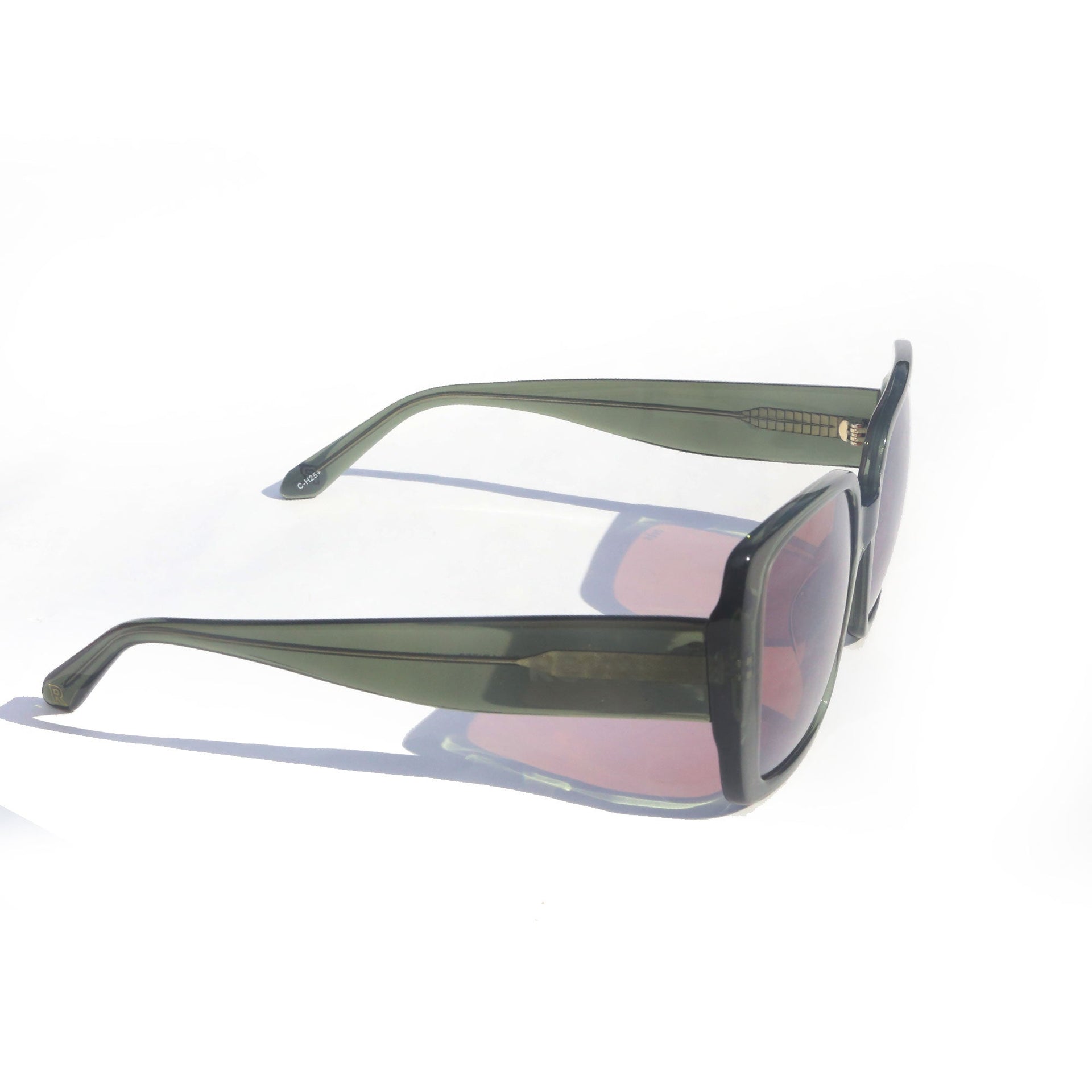 Sunglasses with a reflective surface on a white background